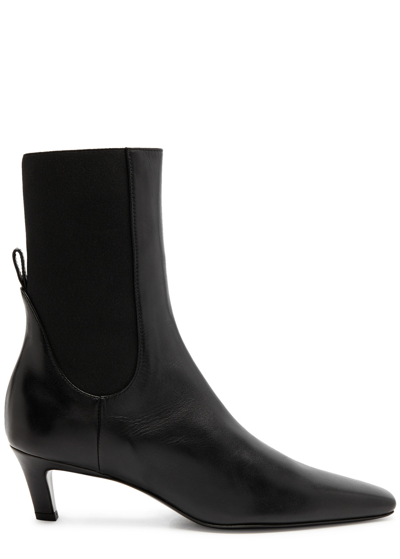 Shop Totême 50 Leather Ankle Boots In Black