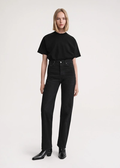 Shop Totême Twisted Seam Denim Full Length Faded Black