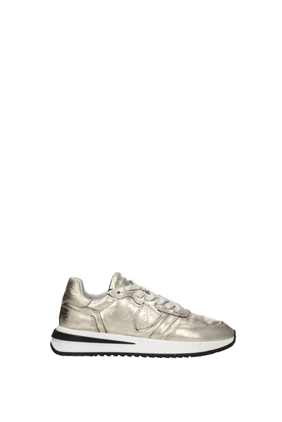 Shop Philippe Model Sneakers Tropez 2.1 Leather Gold