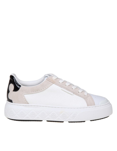 Shop Tory Burch Leather Sneakers In White/black