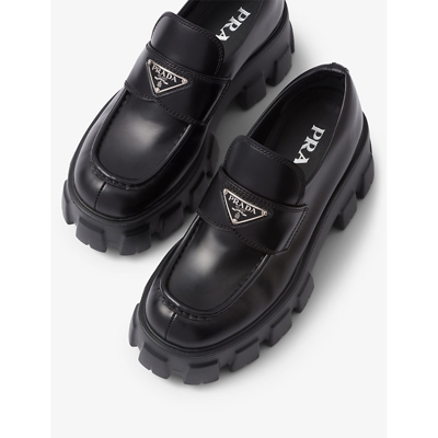 Shop Prada Monolith Logo-plaque Leather Loafers In Black