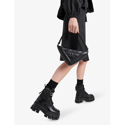 Prada Monolith Leather And Re-nylon Boots With Pouch In Black