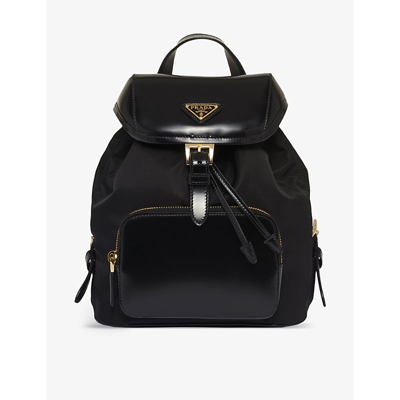 Shop Prada Re-nylon Medium Brand-plaque Recycled-polyamide And Brushed Leather Backpack In Black