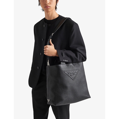 Shop Prada Black Logo-embossed Leather Tote Bag