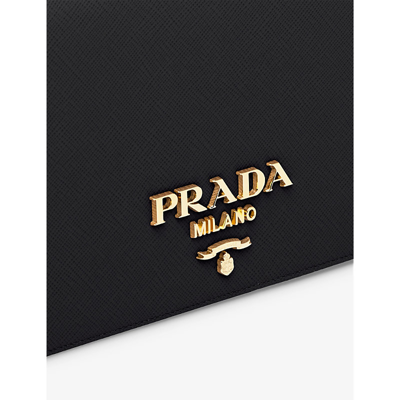 Shop Prada Brand-plaque Mini Saffiano-leather Cross-body Bag In Black