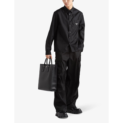 Prada Re-nylon Brand-plaque Recycled-polyamide Shirt In Black