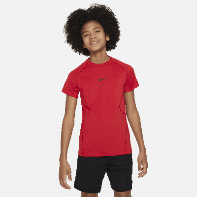 Shop Nike Pro Big Kids' (boys') Dri-fit Short-sleeve Top In Red