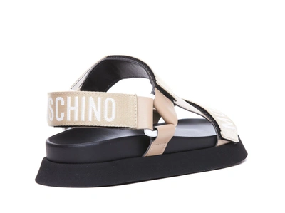 Shop Moschino Sandals In Beige