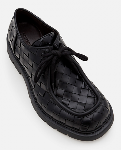 Shop Bottega Veneta Intreccio Loafers In Black