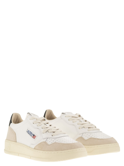 Shop Autry Medalist Low - Leather And Suede Sneakers In White/black