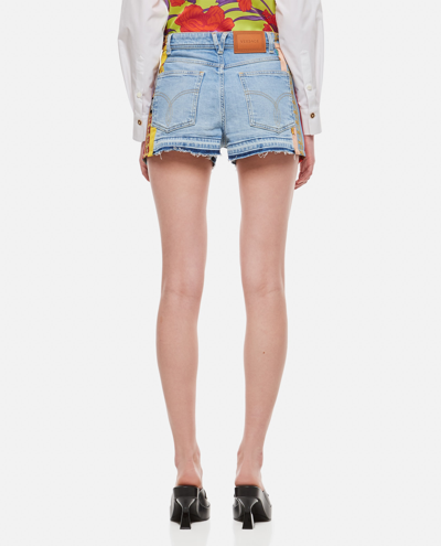 Shop Versace Royal Rebellion Denim Shorts In Clear Blue