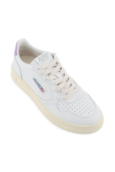 Shop Autry Leather Medalist Low Sneakers In White,purple