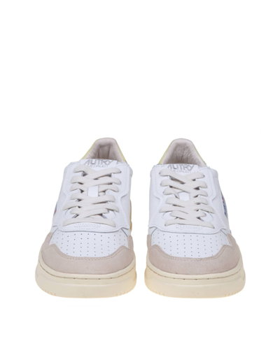 Shop Autry Sneakers In White And Yellow Leather And Suede In White/yellow