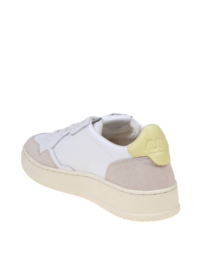 Shop Autry Sneakers In White And Yellow Leather And Suede In White/yellow