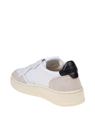 Shop Autry Sneakers In Black And White Leather And Suede In White/black