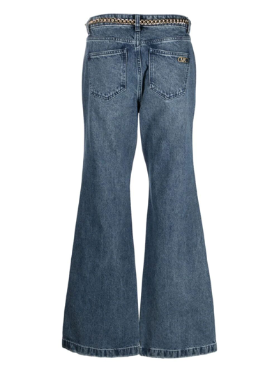 Shop Michael Michael Kors Wide Flared Jeans With Belt In Duskbluewash