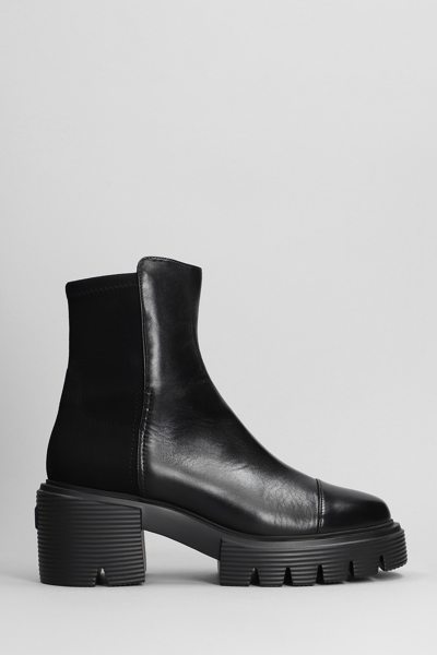 Shop Stuart Weitzman 5050 Soho Bootie Combat Boots In Black Leather