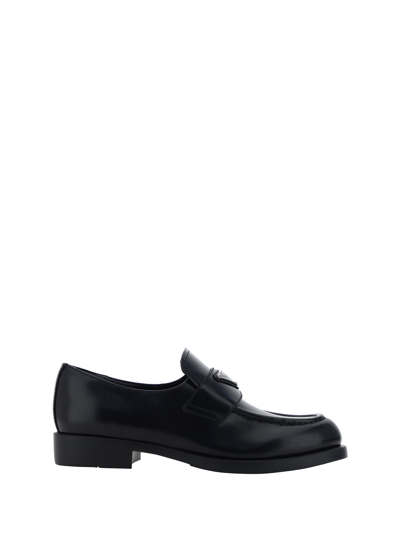 Shop Prada Loafers In Nero