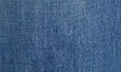 Jw Anderson Twisted Paneled Embroidered High-rise Jeans In Light Blue