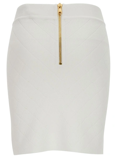 Shop Balmain Hw 6 Btn Knit Short Skirt In White