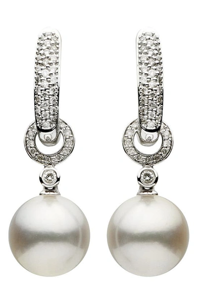 Shop House Of Frosted 14k White Gold Pavé Diamond Pearl Drop Huggie Hoop Earrings In Silver