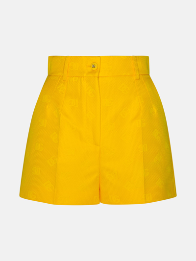 Shop Dolce & Gabbana Yellow Cotton Blend Shorts