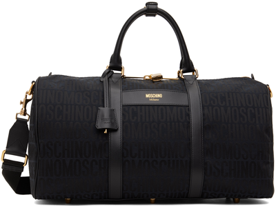Shop Moschino Black Logo Duffle Bag In A1555 Fantasy Black
