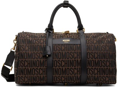 Shop Moschino Brown Logo Duffle Bag In A1103 Fantasy Brown
