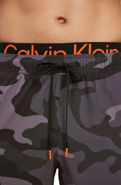 Shop Calvin Klein Modern Euro Swim Trunks In Black Camo