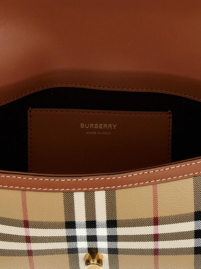 Shop Burberry Note Crossbody Bags Beige