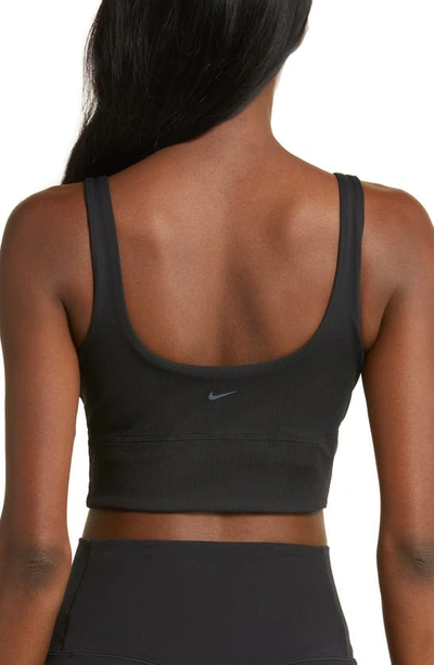 Shop Nike Ribbed Longline Sports Bra In Black/ Black/ Pcg3c