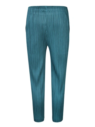 Shop Issey Miyake Trousers In Green