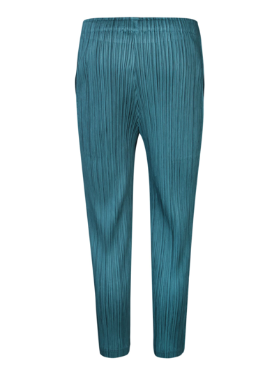 Shop Issey Miyake Pleated Petrol Green Trousers