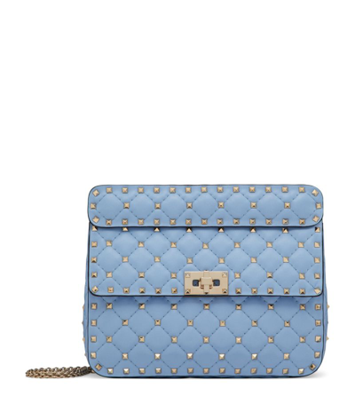 Shop Valentino Rockstud Spike Shoulder Bag In Blue