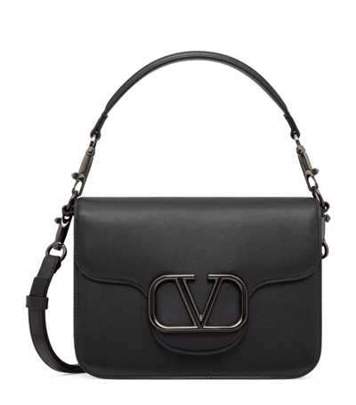 Shop Valentino Leather Loco Shoulder Bag In Black