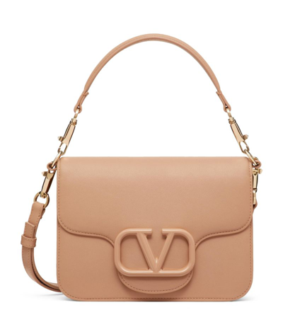Shop Valentino Leather Loco Shoulder Bag In Nude