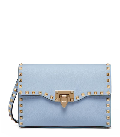 Shop Valentino Small Rockstud Alcove Shoulder Bag In Blue