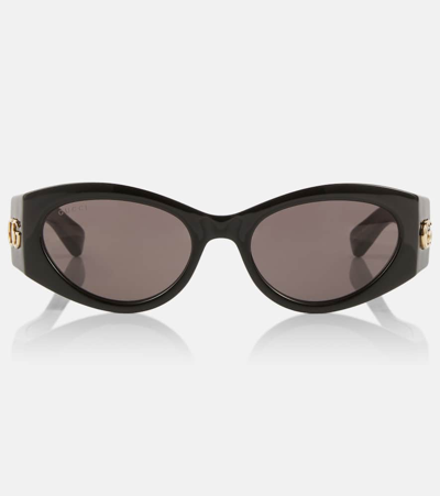 Shop Gucci Gg Oval Sunglasses In Black