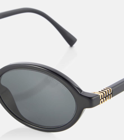 Miu Miu Logo Round Sunglasses In Black