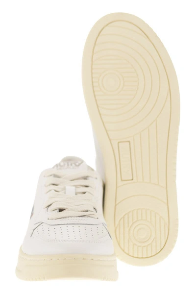 Shop Autry Medalist Low - Leather Sneakers In White/light Blue