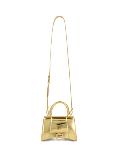 Shop Balenciaga Handbags In Gold