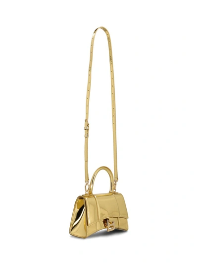 Shop Balenciaga Handbags In Gold