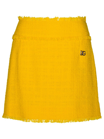 Shop Dolce & Gabbana Logo Plaque Mini Tweed Skirt In Yellow
