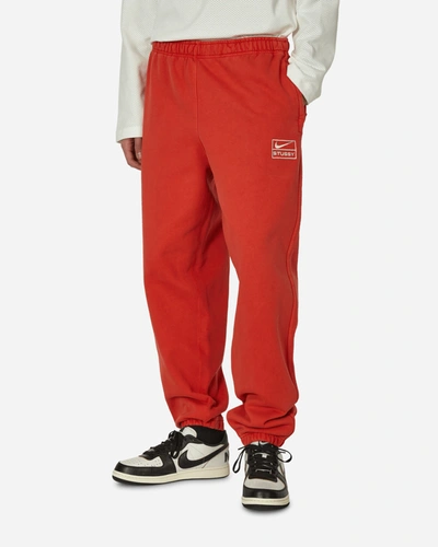 Shop Nike Stüssy Fleece Pants Habanero Red In Multicolor