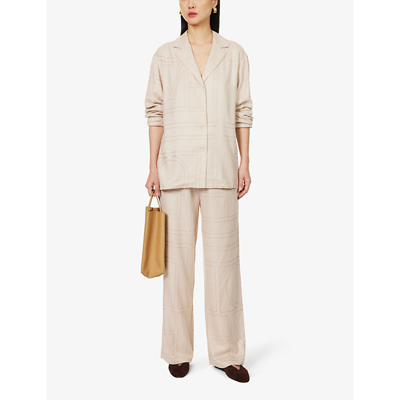 Shop Totême Monogram-embroidered Relaxed-fit Woven Pyjama Top In Light Beigemelange