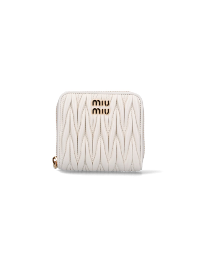 Shop Miu Miu Matelassé Logo Wallet In Cream