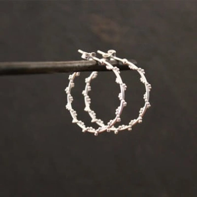Shop Annie Mundy Twist Design Hoop Earring Silver E30 Small In Metallic