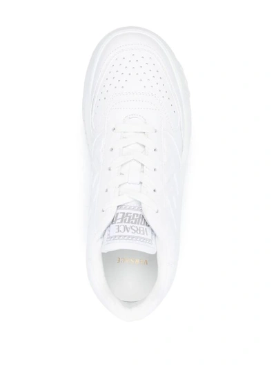 Shop Versace Sneakers With Greca Motif On The Sides In White