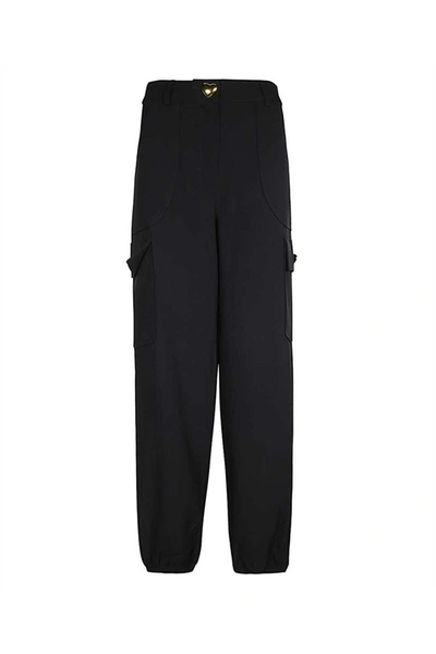 Shop Moschino Trousers In Multicolor