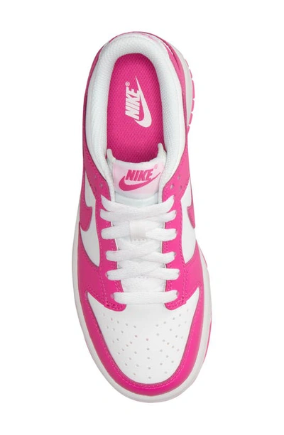 Shop Nike Kids' Dunk Low Basketball Sneaker In White/ Laser Fuchsia
